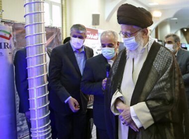 Iranian Supreme Leader Ayatollah Ali Khamenei, right, visits an exhibition of Iran’s nuclear achievements. AP