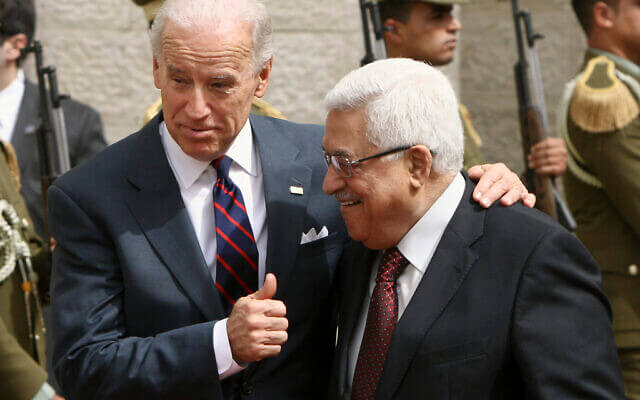 Joseph Biden walks with Palestinian Authority President Mahmoud Abbas. AP