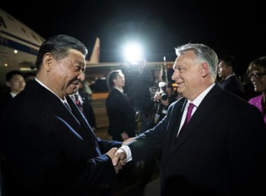 Chinese President Xi Jinping is greeted by Hungarian Prime Minister Viktor Orban. AFP