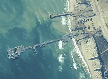 U.S. Army soldiers assigned to the 7th Transportation Brigade (Expeditionary), U.S. Navy sailors assigned to Amphibious Construction Battalion 1 and Israel Defense Forces place the Trident Pier on the coast of Gaza Strip on May 16, 2024. centcom.mil