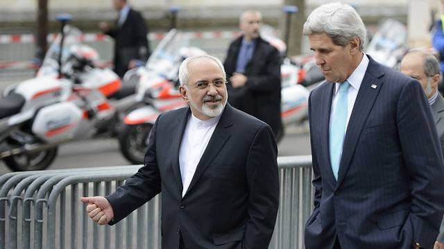 Former Secretary of State John Kerry and former Islamic Republic Foreign Minister Mohammad Javad Zarif in Geneva. AP