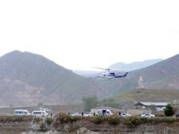 The helicopter carrying Iranian President Ebrahim Raisi takes off at the Iranian border with Azerbaijan after President Raisi and his Azeri counterpart Ilham Aliyev inaugurated dam of Qiz Qalasi, or Castel of Girl in Azeri, Iran, Sunday, May 19, 2024. IRNA