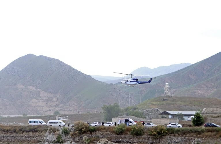 The helicopter carrying Iranian President Ebrahim Raisi takes off at the Iranian border with Azerbaijan after President Raisi and his Azeri counterpart Ilham Aliyev inaugurated dam of Qiz Qalasi, or Castel of Girl in Azeri, Iran, Sunday, May 19, 2024. IRNA