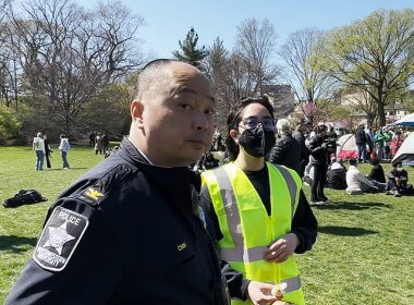 Northwestern University Deputy Police Chief Eric Chin and an anti-Israel protester are asked to return flags stolen from a local resident.