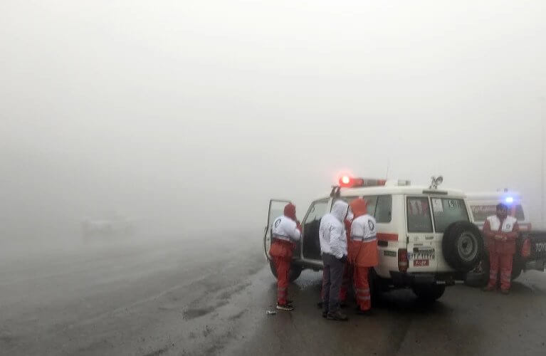 Rescue teams are seen near the site of the incident of the helicopter carrying Iranian President Ebrahim Raisi in Varzaghan in northwestern Iran, Sunday, May 19, 2024. Moj News Agency