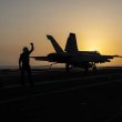 A fighter jet lands on the USS Dwight D. Eisenhower, also known as "IKE," in the Red Sea on Tuesday, June 11, 2024. AP