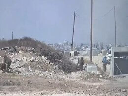 A screenshot of a video released by the IDF showing soldiers and members of a UN aid convoy taking cover during a mortar attack in central Gaza on June 25, 2024. twitter.com