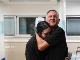 Noa Argamani is embraced by her father, Yaakov, at Sheba Medical Center after being rescued from Hamas captivity, June 8, 2024. IDF