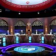 The presidential candidates take part in an election debate at a television studio in Tehran. Morteza Fakhri