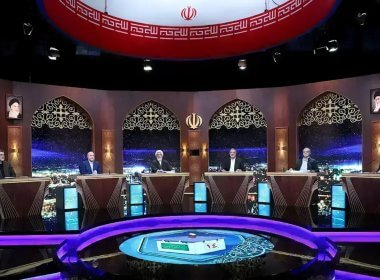 The presidential candidates take part in an election debate at a television studio in Tehran. Morteza Fakhri