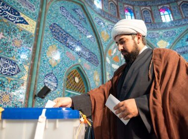 Voting at a polling station in Tehran. Getty