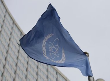 The flag of the International Atomic Energy Agency flies in front of its headquarters during an IAEA Board of Governors meeting in Vienna, Austria. AP