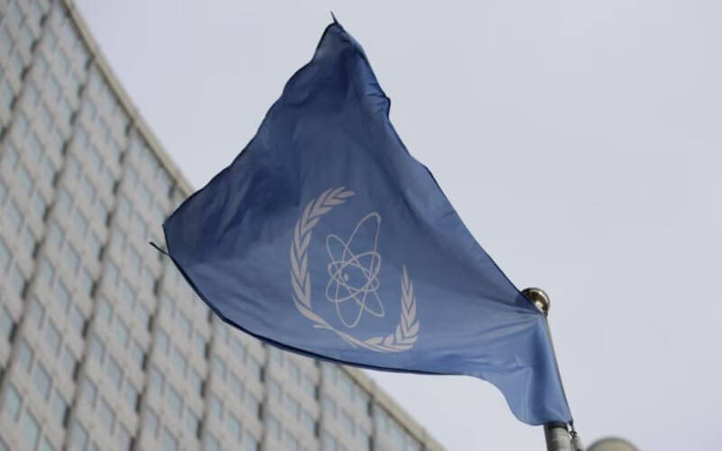 The flag of the International Atomic Energy Agency flies in front of its headquarters during an IAEA Board of Governors meeting in Vienna, Austria. AP