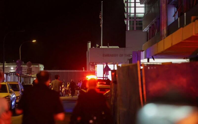 Emergency personnel walk outside a U.S. Embassy branch office situated near the site of an explosion in Tel Aviv, Israel on July 19, 2024. Reuters