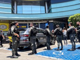 Israeli security personnel stand at the entrance to a shopping mall following a stabbing attack in Karmiel, northern Israel July 3 2024. Reuters