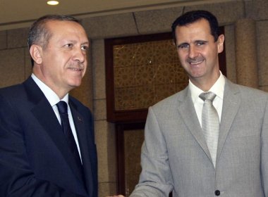 Syrian President Bashar Assad, right, shakes hands with Turkish Prime Minister Recep Tayyip Erdogan. AP