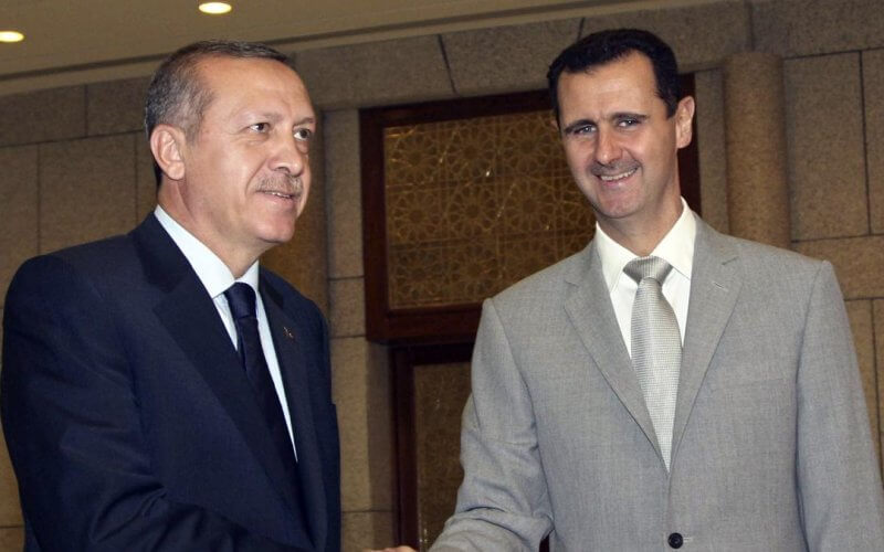 Syrian President Bashar Assad, right, shakes hands with Turkish Prime Minister Recep Tayyip Erdogan. AP