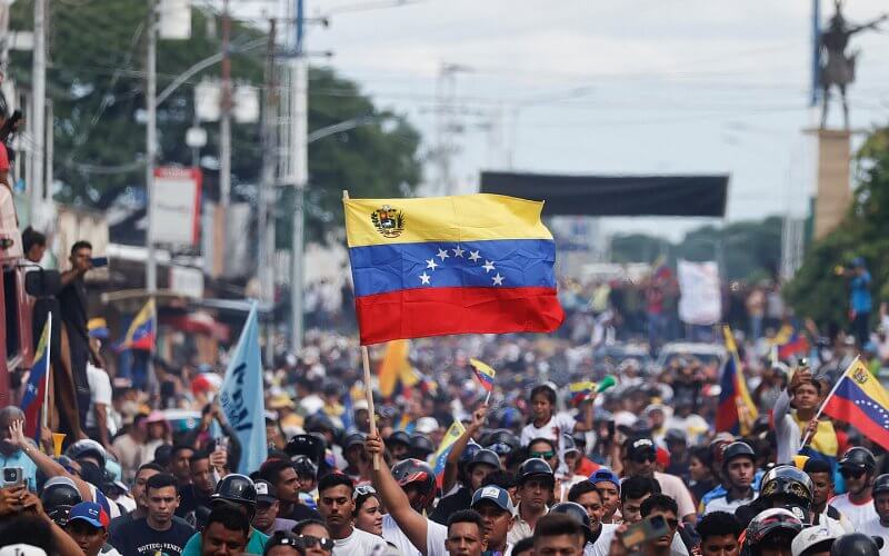 Supporters of the Venezuelan opposition leader María Corina Machado, participate this Wednesday in a presidential campaign tour in Guanare, Portuguesa state | EFE