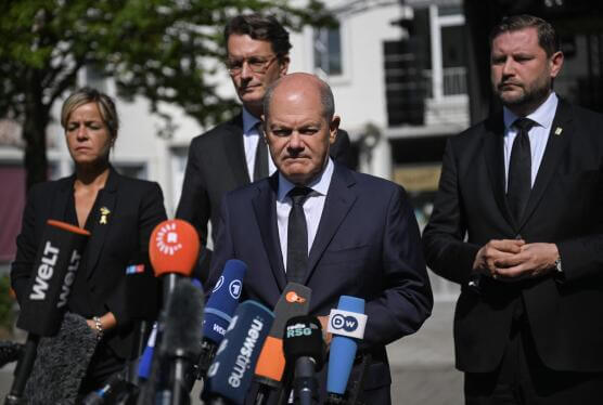 German Chancellor Olaf Scholz addresses the media in Solingen, Germany, August 26, 2024. AFP