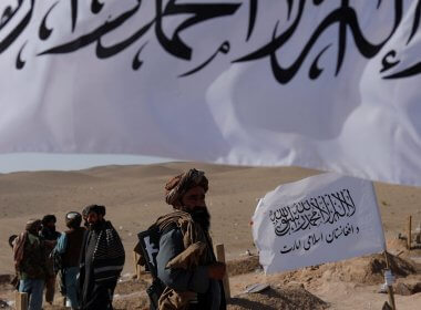 Taliban soldiers walk in a cemetery of victims of the recent earthquake in the district of Zinda Jan, in Herat, Afghanistan October 10, 2023. Reuters