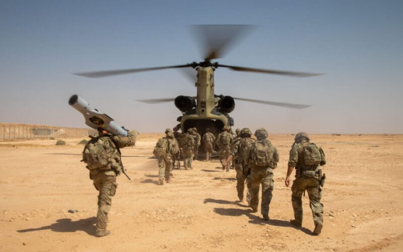 U.S. Army soldiers board a CH-47 Chinook helicopter after a live-fire exercise at Al Asad Air Base, Iraq, July 7, 2023. U.S. Army photo by Spc. Timothy VanDusen