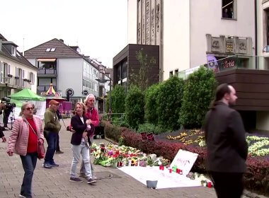 Mourners pay tribute following the knife attack. rumble.com