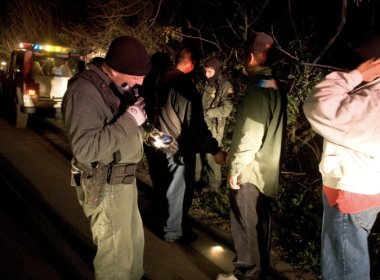 Border Patrol agents conduct pat downs of migrants who crossed the southern U.S. border illegally. U.S. Customs and Border Protection