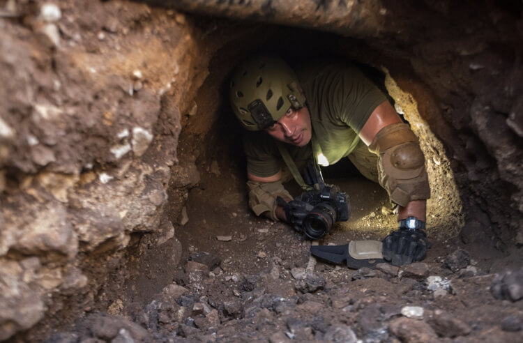 A Border Patrol agent searches a tunnel near Nogales, Arizona.Such tunnels are used to transport drugs under the U.S. border. U.S. Customs and Border Protection