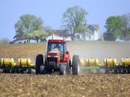 A farmer planting with a tractor near Merna. blogs.Illinois.edu