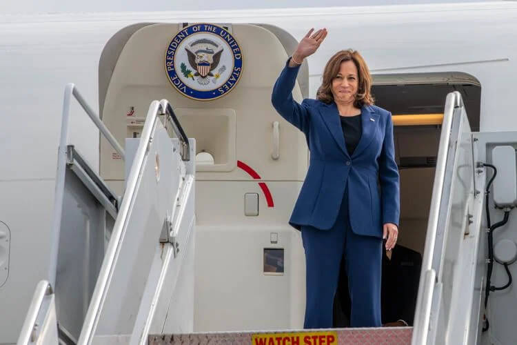 Vice President of the United States Kamala D. Harris waves during her departure at Yokota Air Base, Japan. Staff Sgt. Jessica Avallone | U.S. Air Force photo