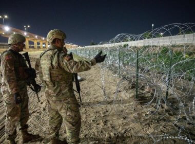 Members of the Texas National Guard erecting razor wire barriers on state land in El Paso, Texas. twitter.com