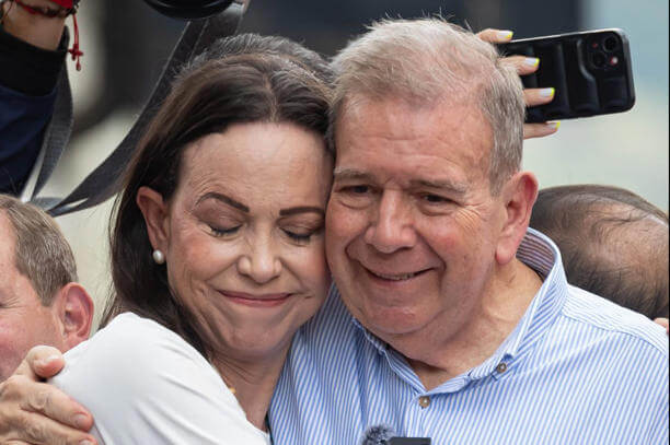 Venezuelan opposition leader Maria Corina Machado (L) hugs Venezuelan presidential candidate Edmundo Gonzalez at a rally in Caracas, Venezuela, on Tuesday. EPA-EFE