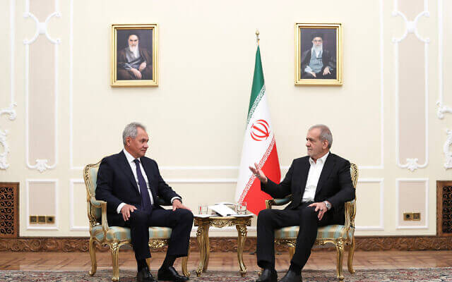 Iranian President Masoud Pezeshkian (R) meeting with Russia’s Security Council Secretary Sergei Shoigu, in Tehran, on August 5, 2024. AFP