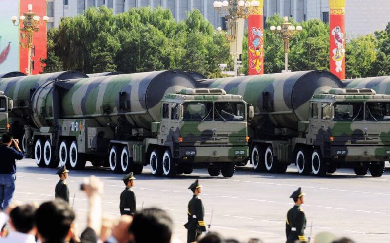 Trailer trucks carrying the Dongfeng 31A, an intercontinental ballistic missile designed to carry a nuclear warhead, take part in a military parade in Beijing. Alamy