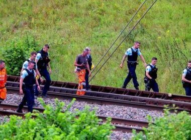 French police and national rail network staff survey high-speed rail lines in Croisilles, northern France, July 26, 2024, after acts of sabotage severely impacted the network on the day of the 2024 Paris Olympics opening ceremony. Reuters