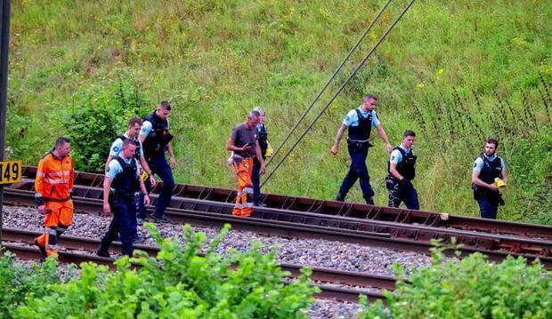 French police and national rail network staff survey high-speed rail lines in Croisilles, northern France, July 26, 2024, after acts of sabotage severely impacted the network on the day of the 2024 Paris Olympics opening ceremony. Reuters