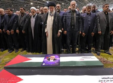 Iranian Supreme Leader Ayatollah Ali Khamenei, center, leads a prayer over the coffins of Hamas leader Ismail Haniyeh and his bodyguard who were killed in an assassination blamed on Israel on Wednesday. AP