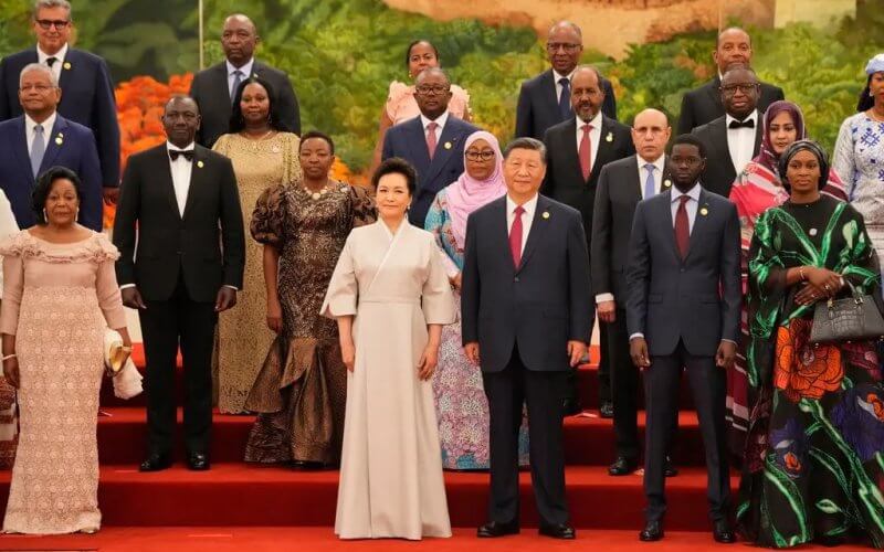 China’s leader, Xi Jinping, and his wife, Peng Liyuan, with leaders of African nations at the Great Hall of the People in Beijing on Wednesday. Ken Ishii