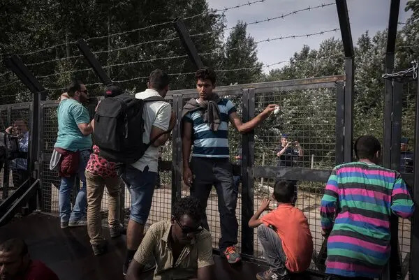 A fence stops migrants in Horgos, Serbia, from entering Hungary. The New York Times