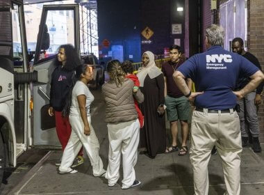 Migrants arrive at the Port Authority Bus Terminal in Manhattan. Bloomberg