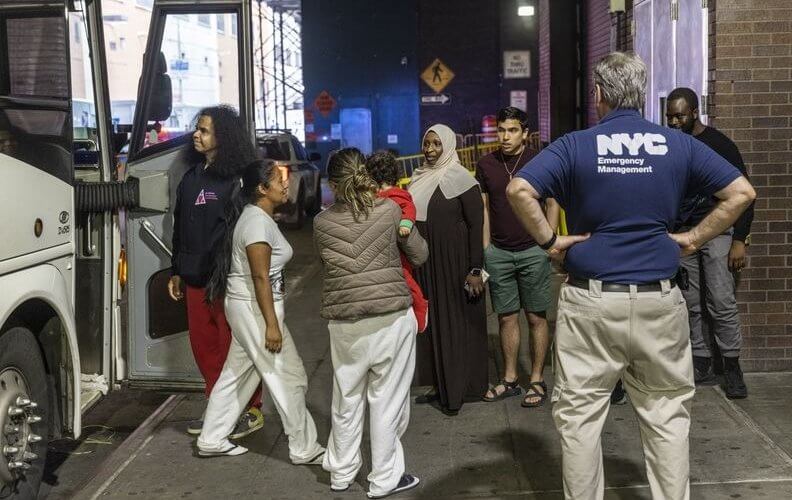 Migrants arrive at the Port Authority Bus Terminal in Manhattan. Bloomberg