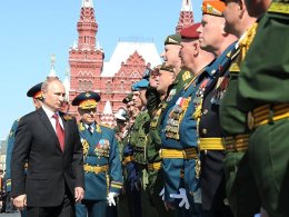 Russian President Vladimir Putin inspects soldiers in Red Square. kremlin.ru