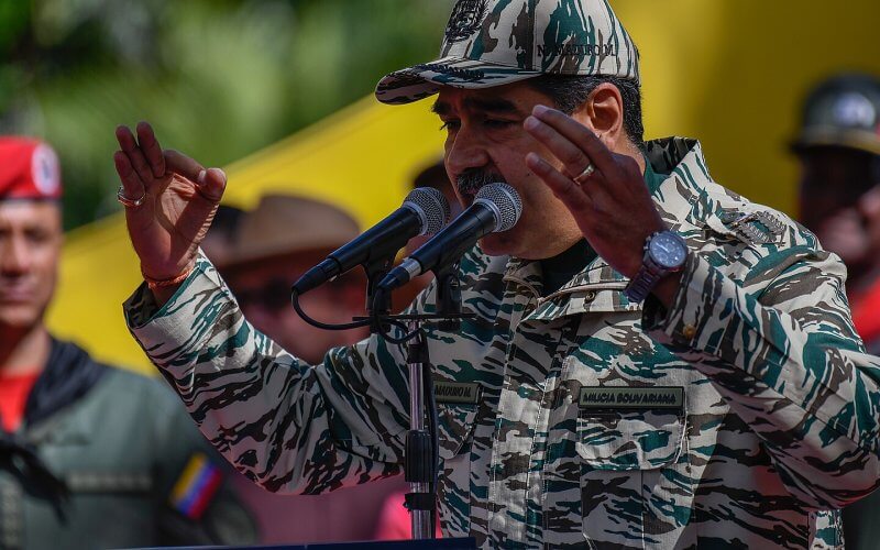 Venezuelan Dictator Nicolas Maduro speaks during a rally on the 22nd anniversary of the coup against Hugo Chavez. shutterstock.com