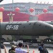 Vehicles carrying DF-5B intercontinental ballistic missiles participate in a military parade at Tiananmen Square in Beijing. AFP