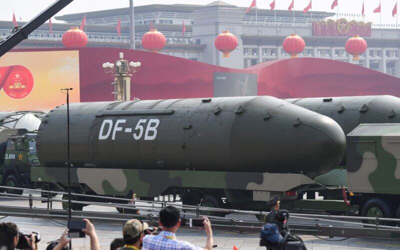 Vehicles carrying DF-5B intercontinental ballistic missiles participate in a military parade at Tiananmen Square in Beijing. AFP