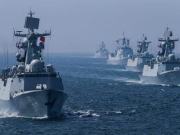 A fleet of Chinese ships sail out at sea after a joint naval drill with Russia. Reuters