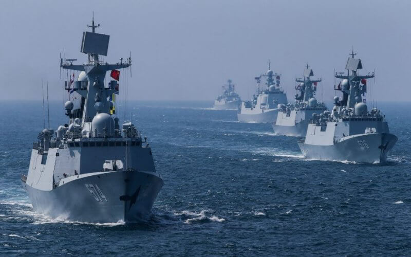 A fleet of Chinese ships sail out at sea after a joint naval drill with Russia. Reuters