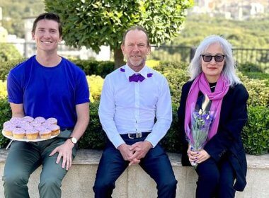 Australian ambassador Ian McConville, center, poses with embassy staff to celebrate "Wear It Purple Day". instagram.com