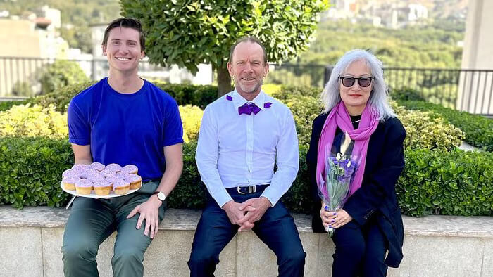 Australian ambassador Ian McConville, center, poses with embassy staff to celebrate "Wear It Purple Day". instagram.com