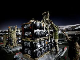 Ukrainian service members unpack Javelin antitank missiles from the United States. Reuters